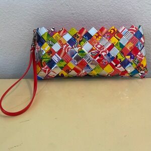 Candy Wrapper Clutch Purse w/Wrist Strap. Never Used. 9" x 4" 2".  Multi Color